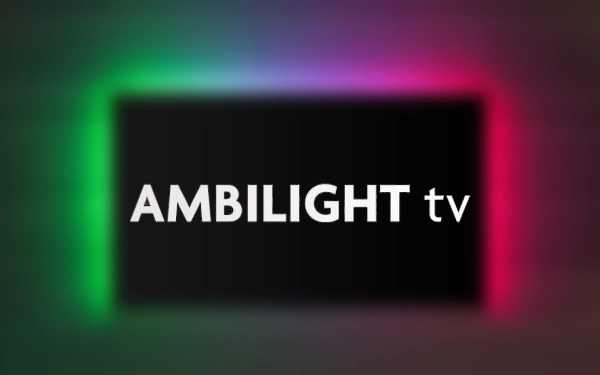 Логотип Ambilight TV на фоне цветных огней – символ технологии подсветки экрана в телевизорах.