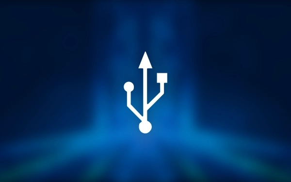 Білий значок USB (універсальна послідовна шина) на синьому фоні з ледь помітним світловим ефектом.