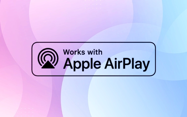 Логотип «Працює з Apple AirPlay» на рожево-блакитному фоні символізує сумісність з Apple AirPlay.