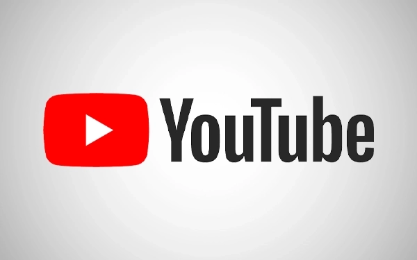 Логотип YouTube – червона кнопка відтворення поруч із чорним знаком YouTube на світлому фоні
