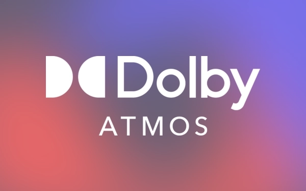 Логотип Dolby Atmos на фіолетово-червоному фоні – символ технології об'ємного звуку